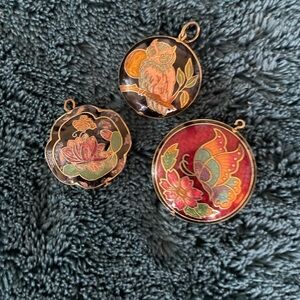 Cloisonné pendants.